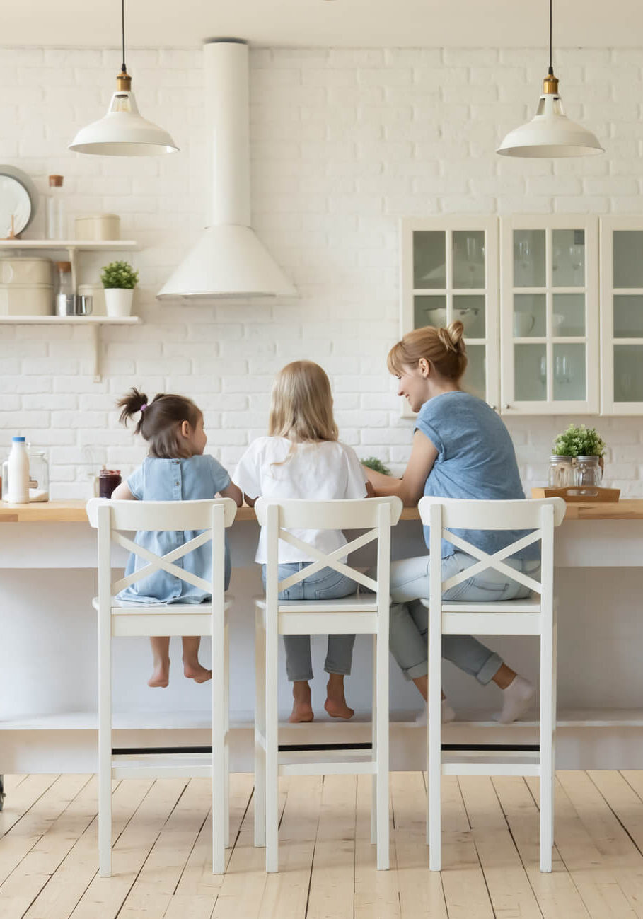 family at kitchen counter